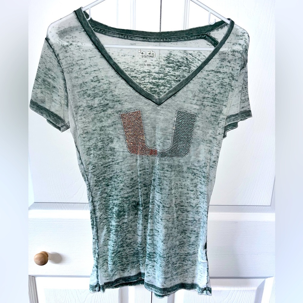 Miami shirt used in great condition size woman's small.